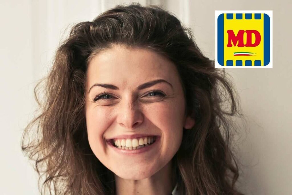 donna che sorride e log di MD