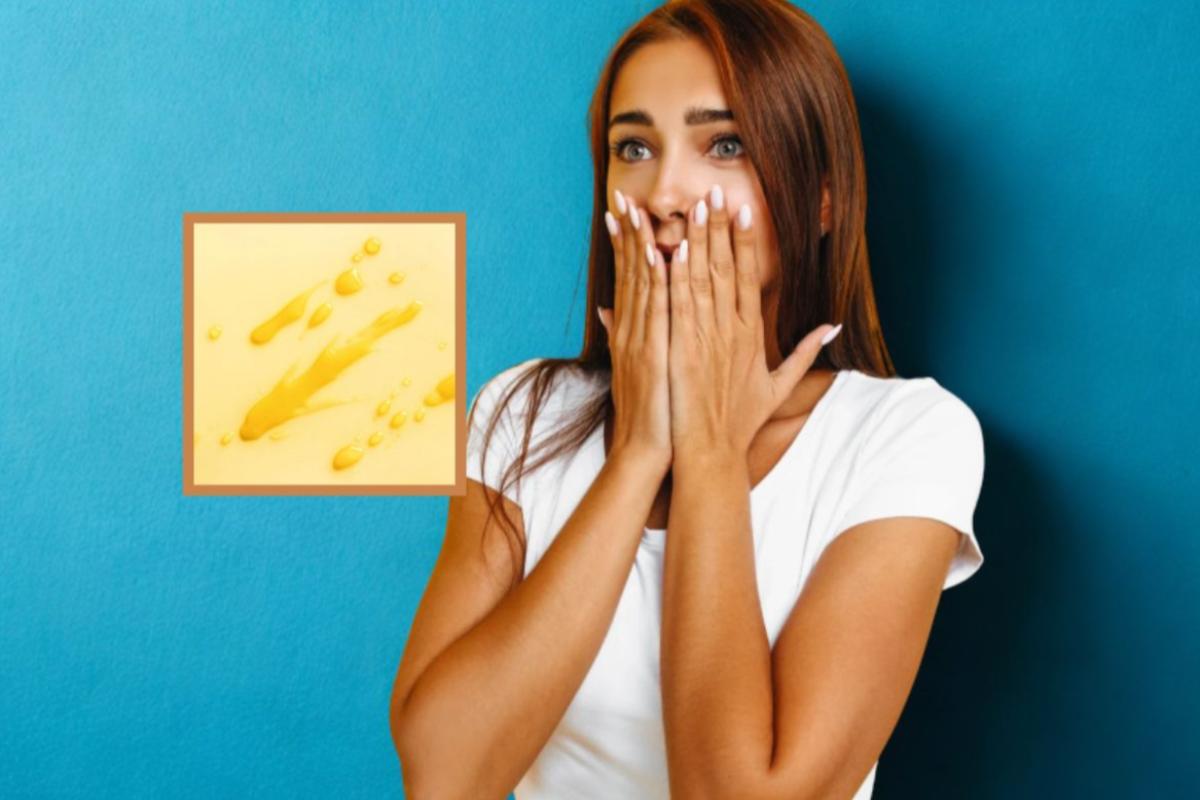 donna con la mani davanti alla bocca e nel riquadro delle macchie di olio